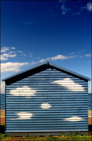 whitstable,tankerton,beach huts,clouds